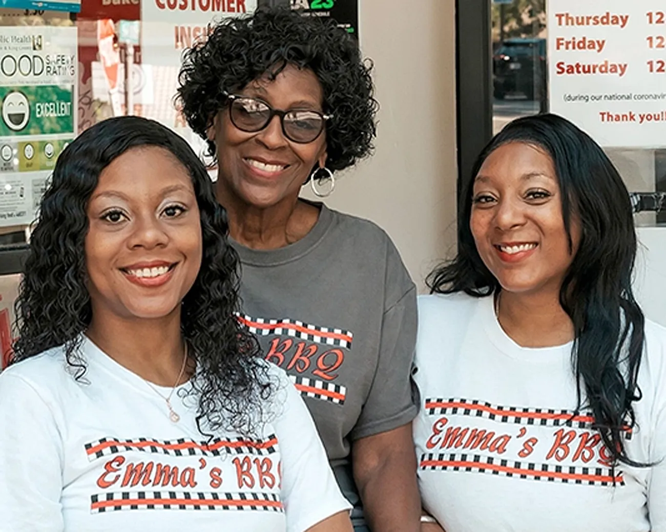 Rasheena Thomas, Tess Thomas-Anderson and Miceala Thomas together at Emma&rsquo;s BBQ.